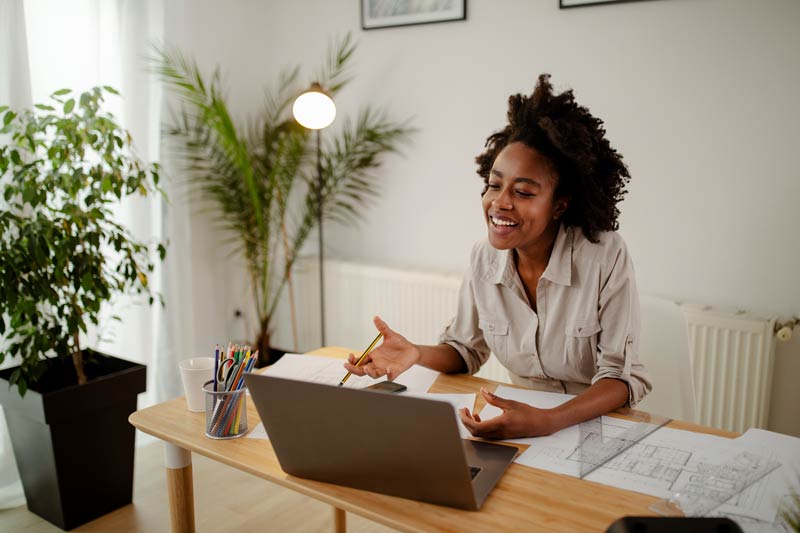 Black woman smiling and talking