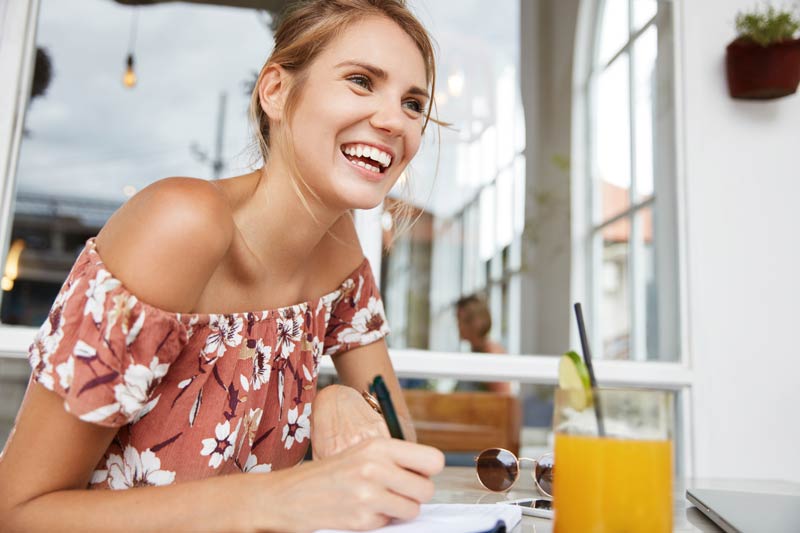 Female student sitting in cafeteria