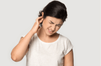woman dealing with tinnitus