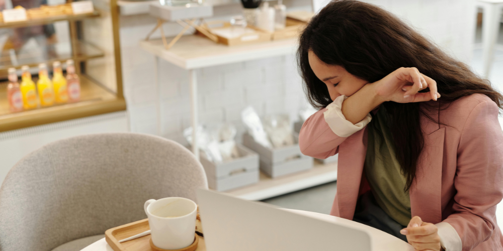 Photo of woman sneezing