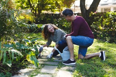 Happy couple gardening allergy free