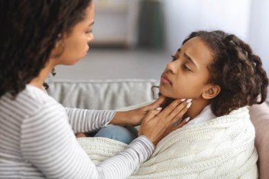 Little girl with sore throat