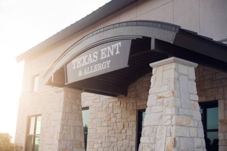 Front of office building with Texas ENT & Allergy sign